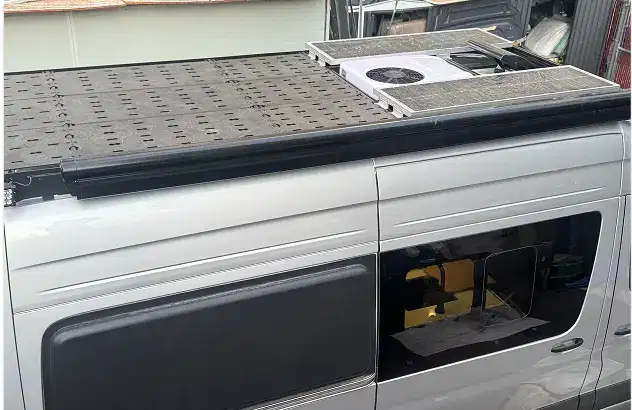 Van with roof tracks