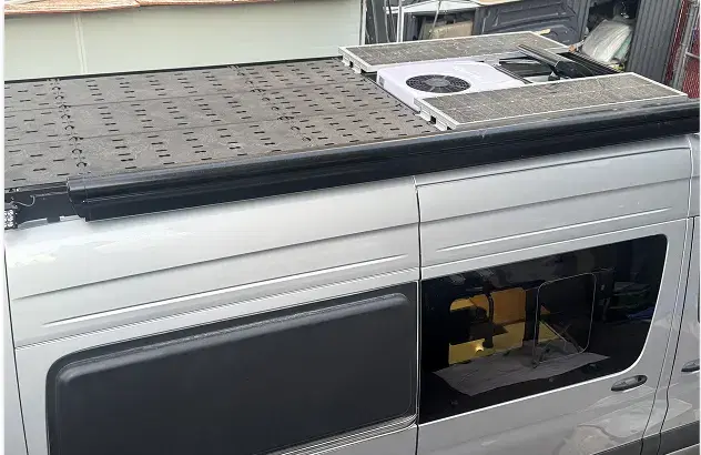 Van with roof tracks