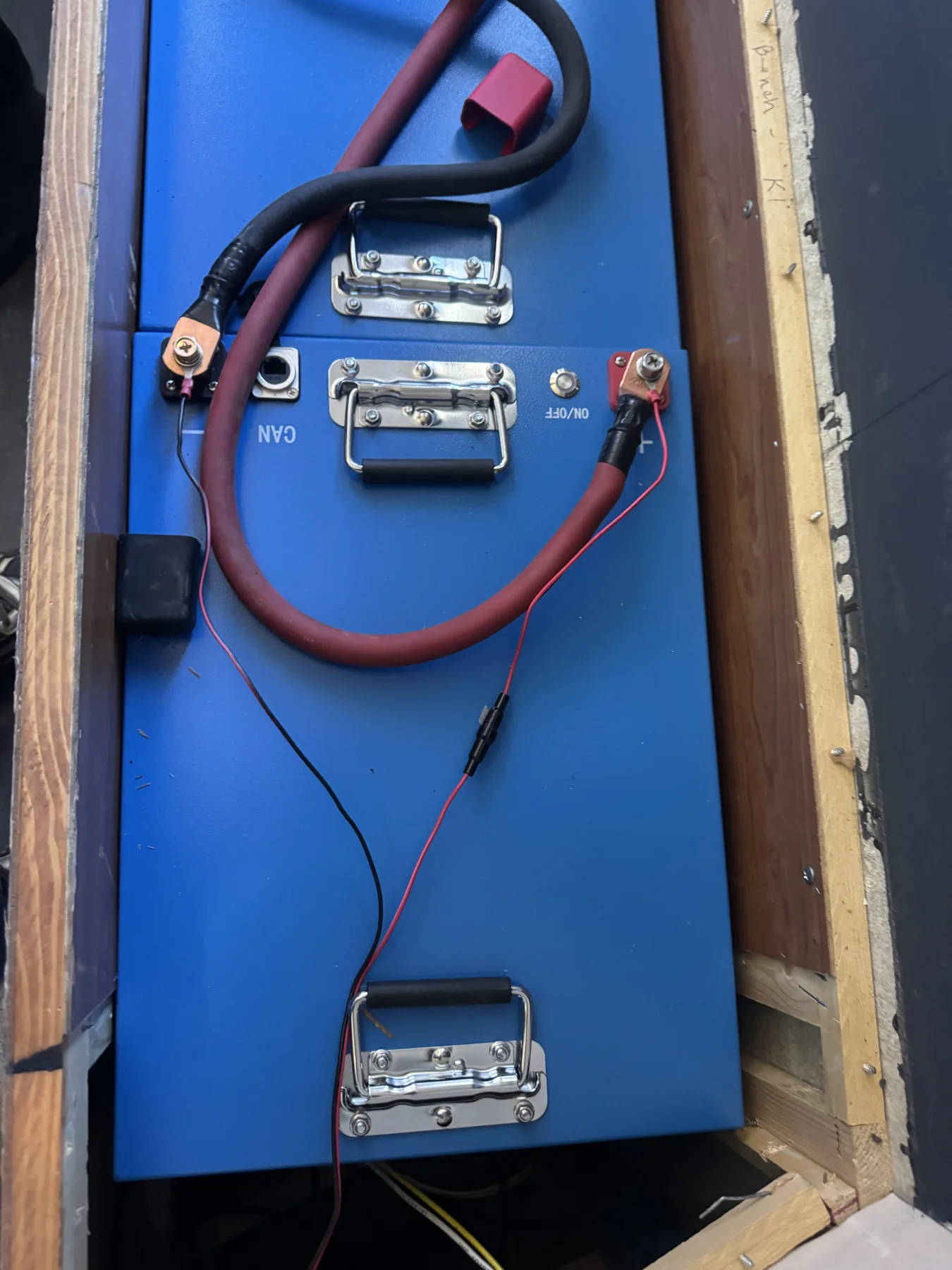 LiFePO4 battery storage installed beneath seating